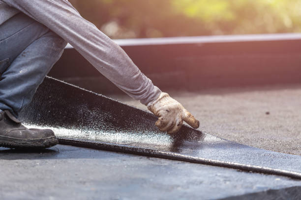 Professional Waterproofing technician working in Loveville, MD